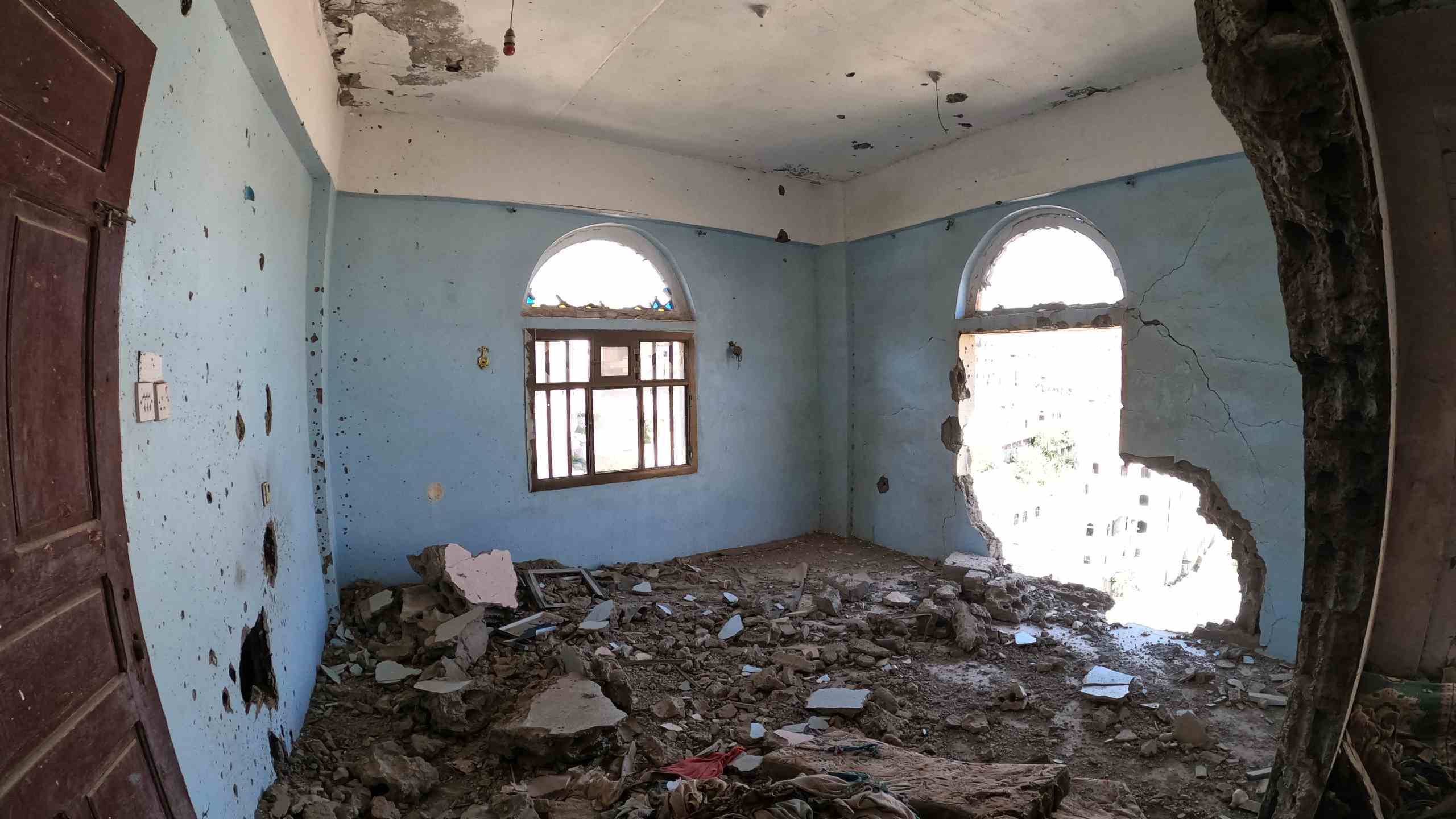 A room destroyed by shelling. © Khalid Al-Banna/NRC