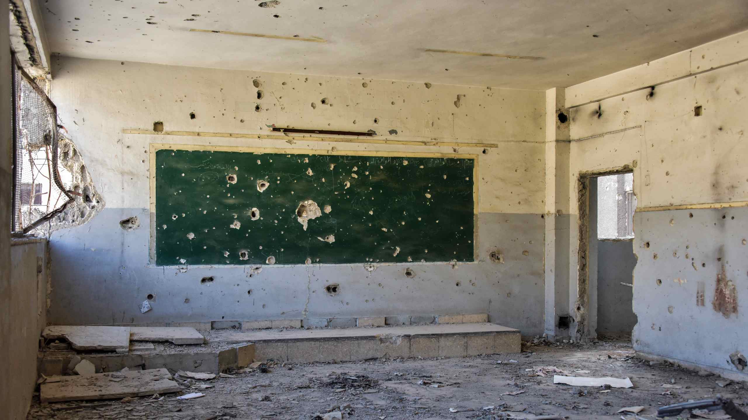 Damage to an elementary school caused by fighting in Barzeh, north of Damascus, Syria.